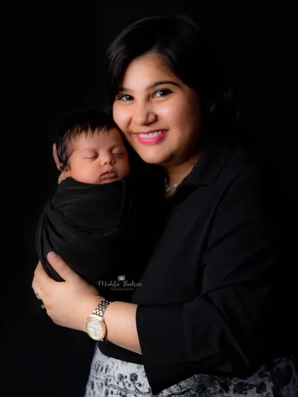 A mother's love. This beautiful portrait captures the special connection between a mom and her brand new baby.