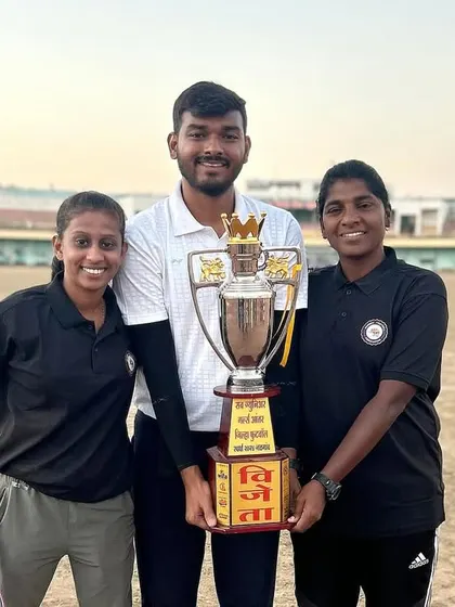 The future is bright for women's football. Our coaches stand proudly with the victorious Mumbai Sub-Junior Girls' Team at the WIFA Inter-District Championship, holding the trophy high.
