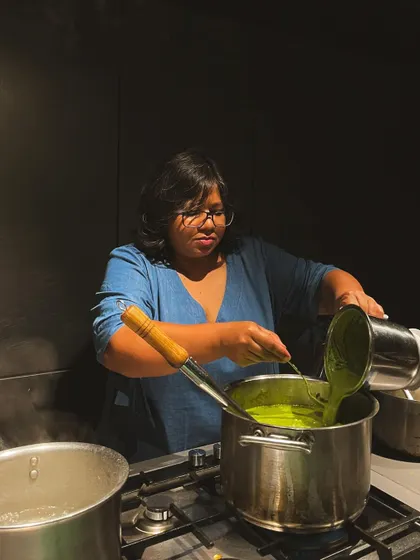 Cheesemaker Namrata Sundaresan of Käse preparing a dish. Her pop-up was a beautiful marriage of cheese and Chennai, demonstrating how regional Indian flavors can be infused into artisanal cheesemaking.