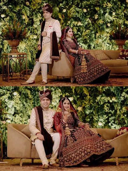 A classic staged portrait of the couple against a beautiful green wall backdrop.