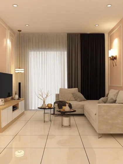 A view of the seating area in a contemporary living room. The design uses wall mouldings, elegant curtains, and modern lighting to create a sophisticated yet comfortable space.