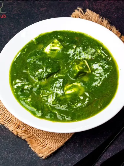Palak Paneer, a symphony of vibrant spinach, aromatic spices, and soft paneer perfection. It's a classic dish that's both healthy and incredibly delicious.