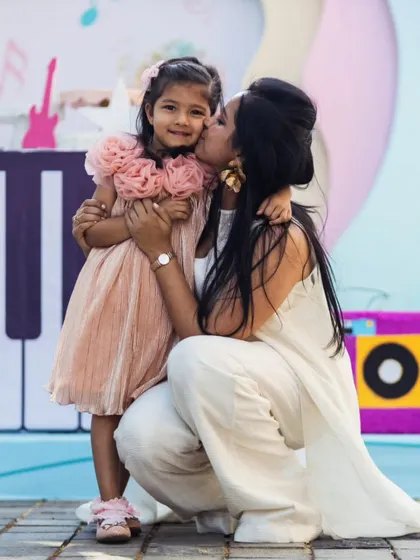 A tender moment between mother and daughter at the music-themed party. The love and happiness shared here are the true reasons we pour our hearts into every event.