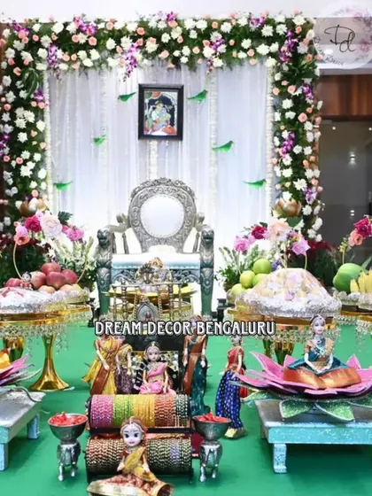 A closer look at the intricate plate decor for a Seemantham. We arrange traditional sweets, fruits, and dolls (Marapachi Bommai) to create a beautiful and auspicious display.