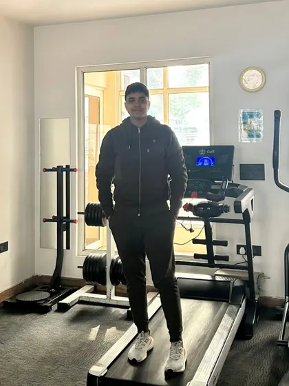 Standing on the treadmill.
