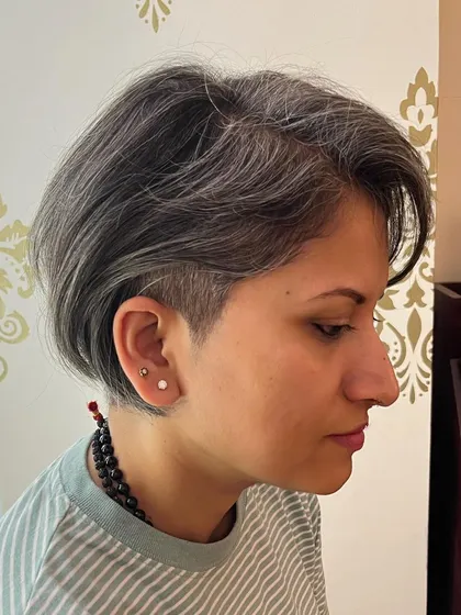The side view showing the edgy side-shave detail.
