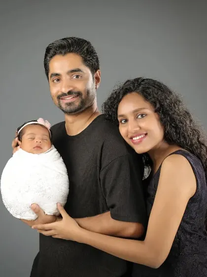 A beautiful first family portrait. The way they gaze at their new baby, and each other, is filled with so much love and wonder.