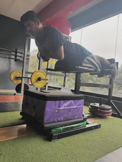 A back extension hold, an isometric exercise that builds endurance in the lower back and hamstring muscles.
