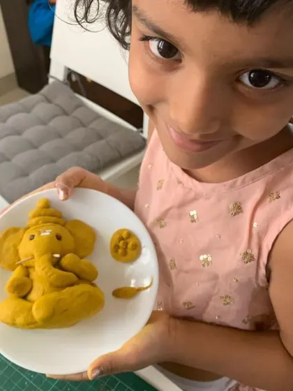 Look at the pride and joy in their creations! For Ganesh Chaturthi, children used various materials like clay, leaves, and paper to create their own Ganesha figures. This is a wonderful fusion of art, culture, and personal expression.
