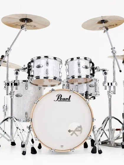 The Pearl PMX kit shown in a crisp White Marine Pearl finish, complete with professional-grade hardware.