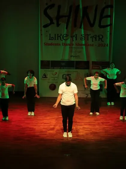 A student takes the lead in this group performance.