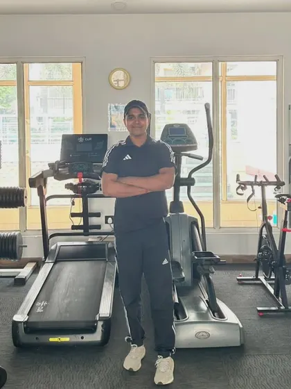 Standing in the gym in Noida Sector 45, surrounded by the tools we use to build stronger bodies.