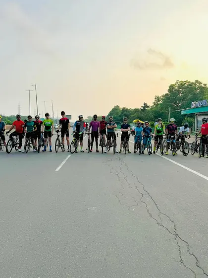 The group posing together for a birthday ride.