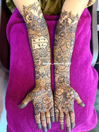 A full view of the 'Samra weds Zohaib' design, showing how the text is placed on the forearm.