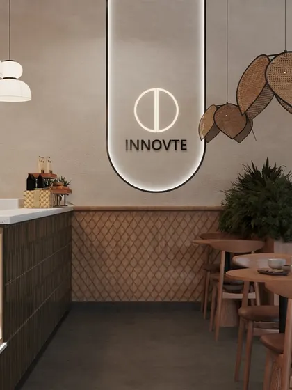 A detail shot showing the intersection of different design elements: the diamond-patterned wall texture, the sleek counter, and the unique leaf-shaped pendant lights. It's this layering of details that gives a space its character.