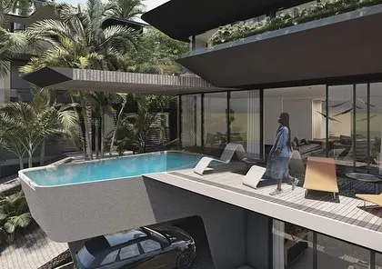 A cantilevered pool at our Dona Paula project. The dynamic shifting of floor plates and roofs creates dramatic architectural moments like this, where the pool seems to float above the garage and out into the landscape.
