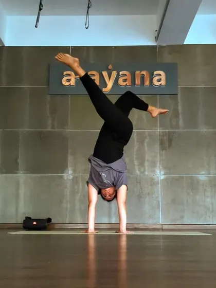 Let it hurt, then let it go. A creative handstand shape, embodying the process of moving through challenges.
