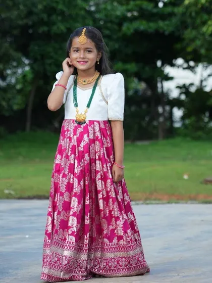A smile that says it all. She looks radiant in her traditional Pattu Pavadai style outfit. I focus on creating ethnic wear that is not only beautiful but also comfortable enough for kids to enjoy their day.