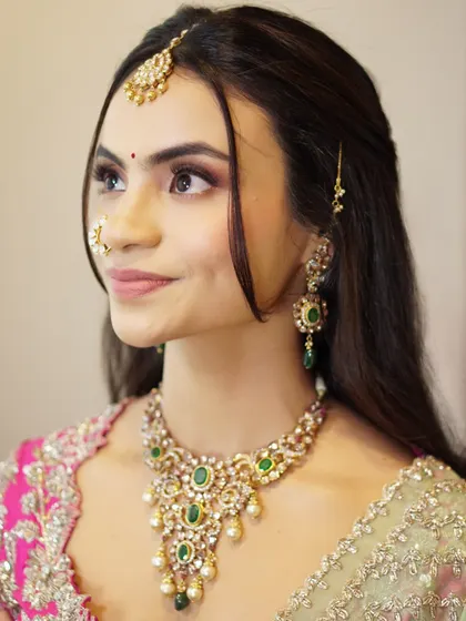Radiance in every detail for Likitha. This soft glam look features a gentle shimmer on the eyes, flushed cheeks, and a velvet matte lip to enhance her natural charm.