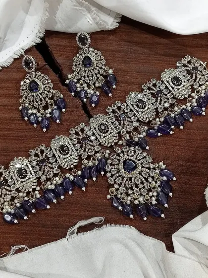 Another look at the stunning sapphire blue Victorian choker set. The detailed craftsmanship and high-quality stones make it a truly luxurious piece for your jewelry collection.