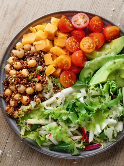 A deconstructed salad bowl, showing the fresh ingredients you'll learn to work with in my salad workshops. I focus on creating balanced and nutritious meals.