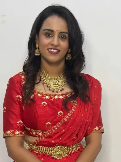 A close-up of the red blouse with subtle embroidery, part of my Navaratri Day 6 outfit.