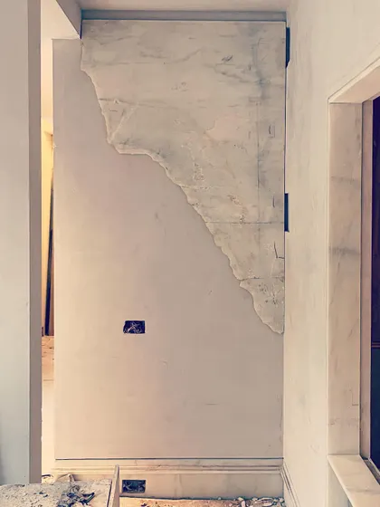 A work in progress where we are creating a unique wall art installation from broken marble slabs. We find beauty in imperfection and enjoy giving discarded materials a new, artistic life.