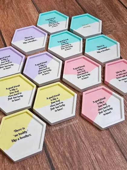 A full set of the custom quote coasters for a birthday party. The mix of pastel colors and heartfelt messages makes each one a special keepsake.