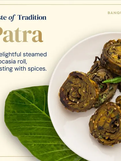 Patra is a delightful steamed colocasia roll, bursting with spices. This traditional Gujarati snack is a unique and flavorful addition to any wedding menu.