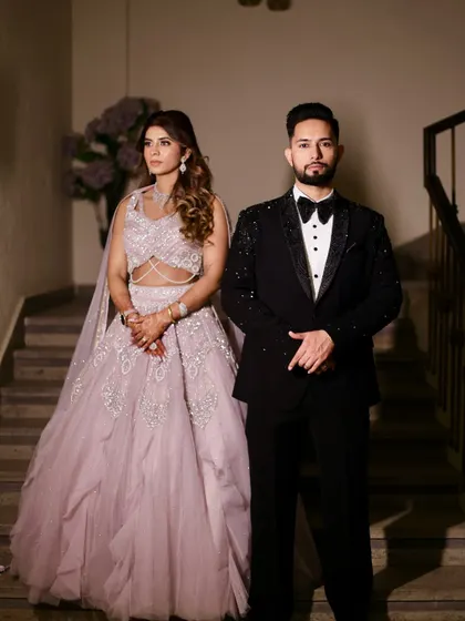 The power of a bespoke tuxedo lies in its fit and presence. Here, the detailed craftsmanship of the jacket is on full display, offering a bold and confident look for any groom or wedding guest.