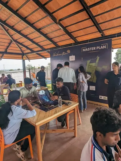 Celebrating the success of Day 1 at our Vaikuntam project launch. This image captures the energy and interest as our team engages with future members of the community.