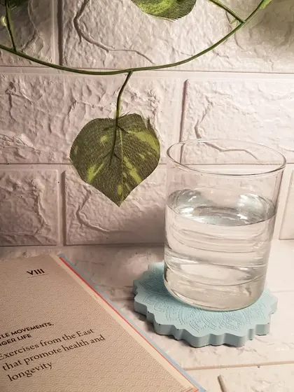 Another shot of the coaster in a real-life setting, adding a touch of intentional design to an everyday moment.