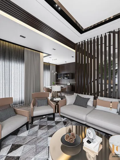 A view from the seating area, showing the cohesive design language of dark wood and neutral tones that flows through the space.