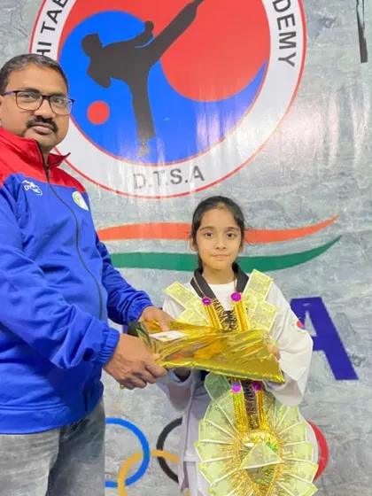 A special moment honoring Naysha for her bronze medal at the sub-junior nationals in Panchkula.