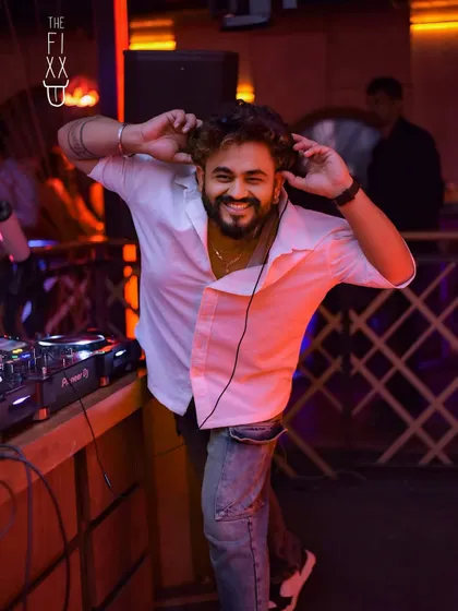 A happy, energetic shot of me at The Fixx. I'm always smiling because I genuinely love what I do.