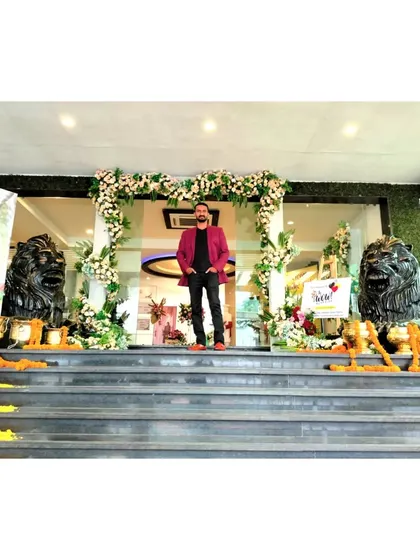 Posing at the entrance of the wedding venue in Saputara. It was an honor to be chosen as the surprise entertainment for the couple's special day.