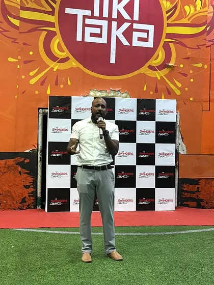 Our director, Prasanna, addresses the students and parents at the graduation ceremony, sharing words of encouragement and pride.