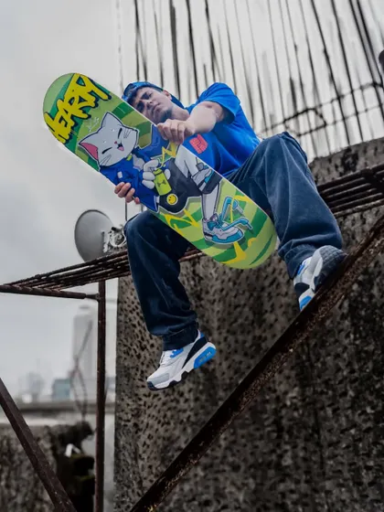 An action shot from the Hearty Skateboards photoshoot. The urban rooftop setting was the perfect backdrop for this graffiti-inspired deck.