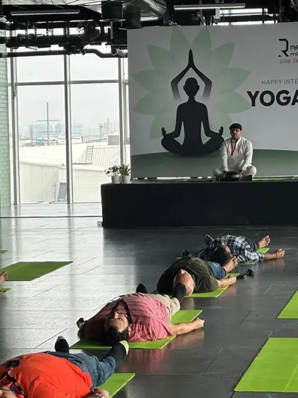 A moment of deep relaxation in Savasana during a corporate event for International Yoga Day. I guide employees through calming sequences that help quiet the mind and restore energy, which is essential for a balanced and productive work environment.