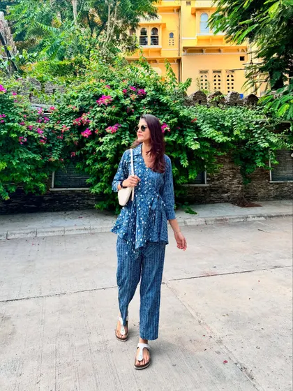 A casual stroll through the streets of Udaipur. This printed blue co-ord set with a peplum top and matching pants was comfortable for walking while still looking put-together and stylish against the city's colorful backdrop.