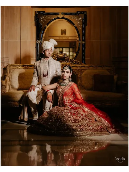 A regal portrait of the bride and groom. We help style these timeless shots, ensuring they capture the grandeur and elegance of the day.