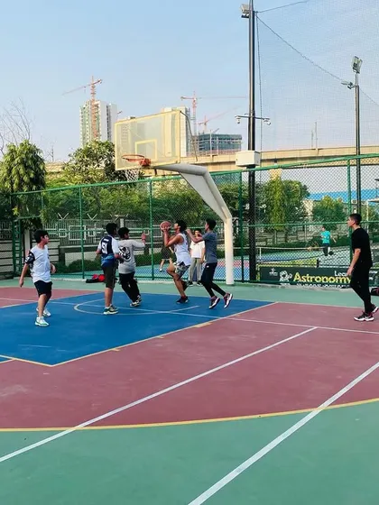A player finishes a layup during a fast break. We love to play an up-tempo game.