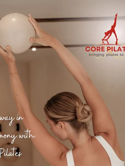 Sway in harmony with Pilates. This client uses a stability ball to add a range of motion and support during an upper body stretch.