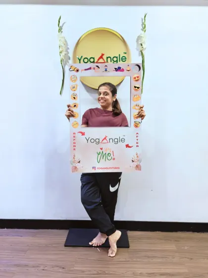 The YogAngle effect is real. This member's bright smile captures the feeling of accomplishment and joy that comes after a challenging yet rewarding practice.