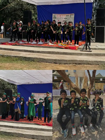 Students perform on stage at the Eco Mela, using art and dance to call for environmental change.