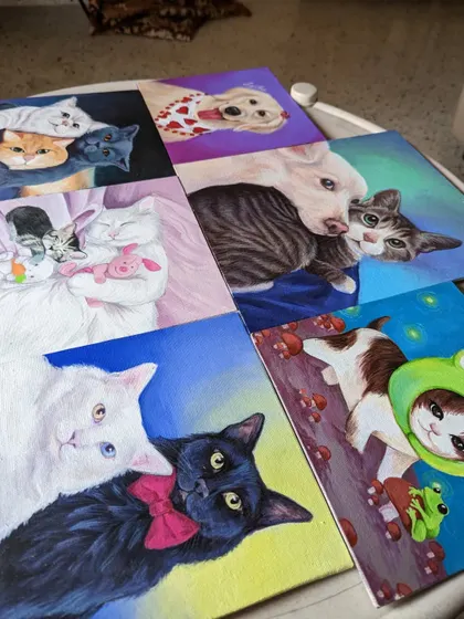 A collection of custom cat and dog portraits I've painted. Each one tells a story, from cozy sleeping kittens to dapper cats in bow ties.