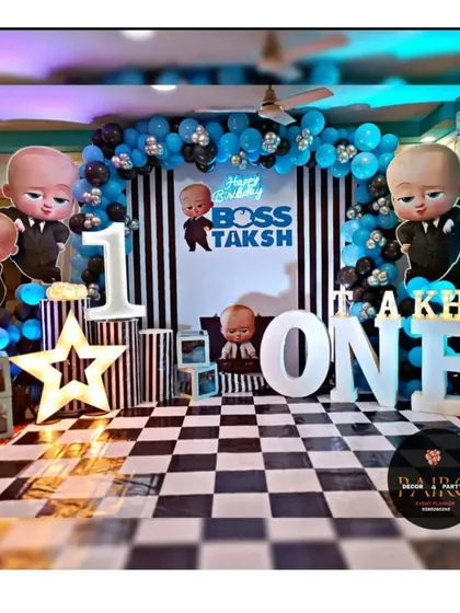 A stylish Boss Baby theme with a black-and-white striped backdrop and a checkered floor for a modern look.