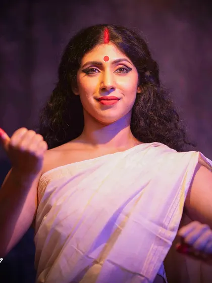 A pose of readiness and power, as the goddess is fully invoked on Navami. The story questions whether the inclusivity in her creation extends to our society in practice.