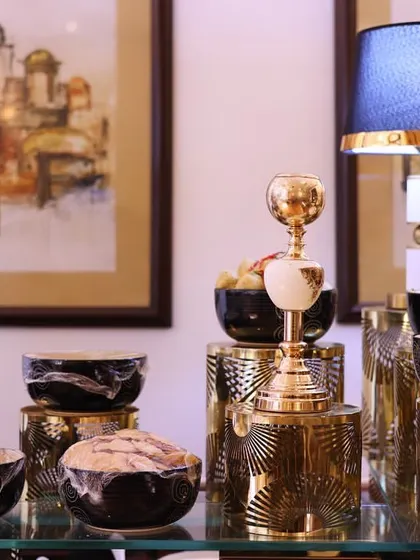 A section of our modern chaat station, where traditional flavors meet contemporary design. The setup features artistic decor, framed paintings, and stylish lamps to create a sophisticated ambiance.