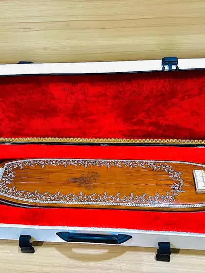 The Sri Saraswati Tanpura, also known as a box tanpura or handy tanpura. It is very compact and comes in its own case, making it the perfect travel companion for any musician.